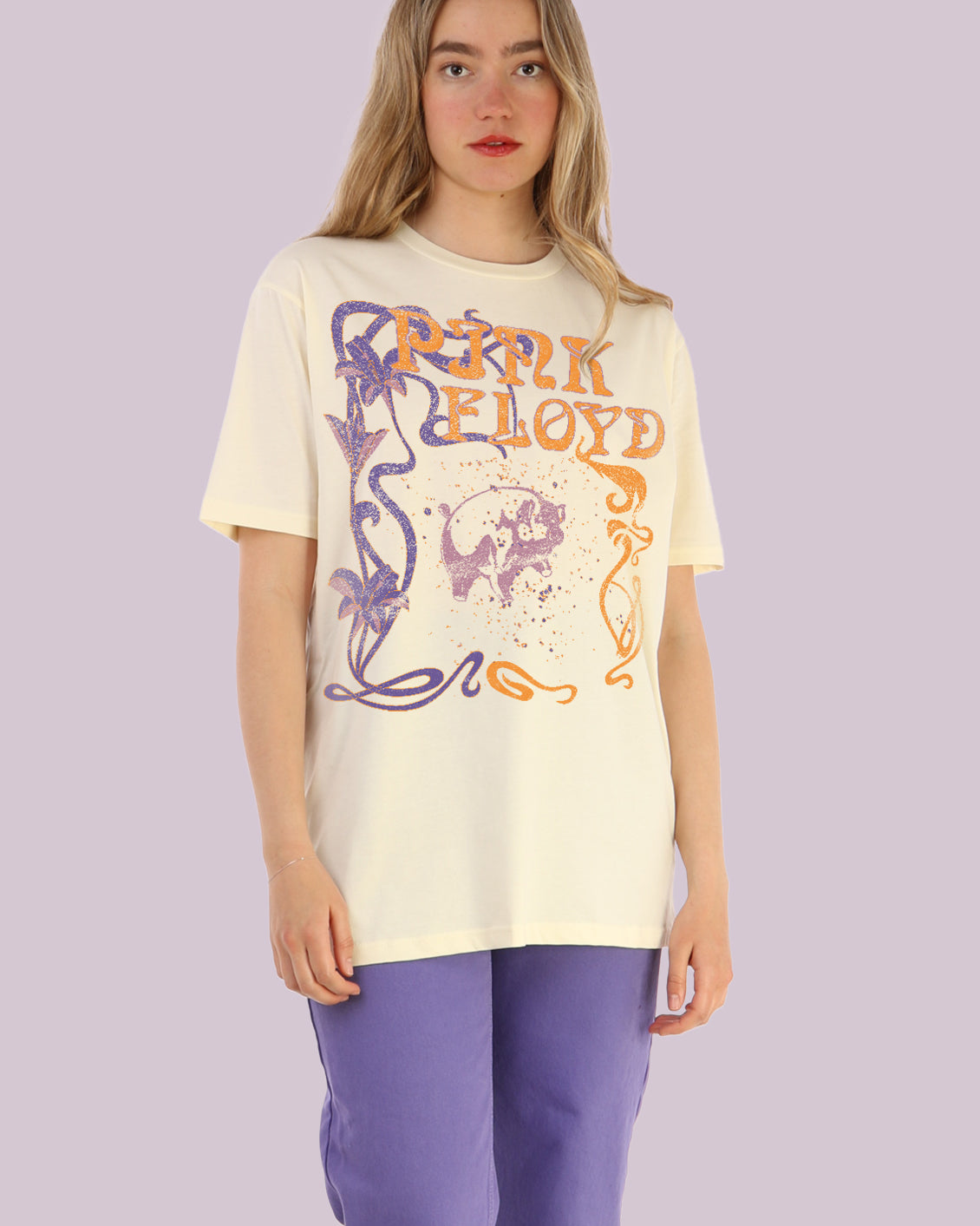 Pink Floyd vintage graphic design with pig in the middle, on light sand coloured tee